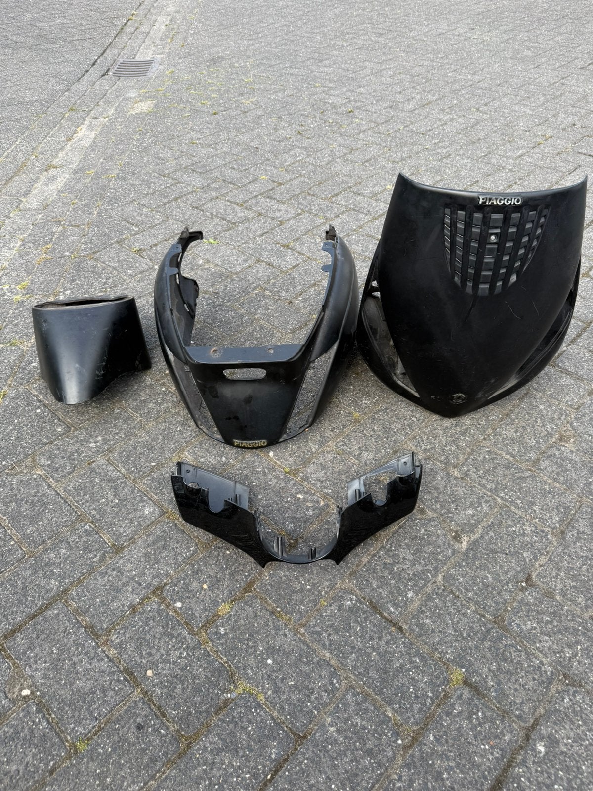 Piaggio Zip kappenset zwart alle ophangpunten, Ophalen