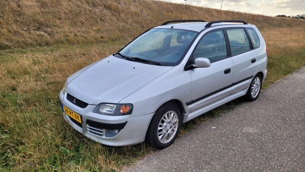 Mitsubishi Space Star 1.6 Comfort AUT 2005 Grijs, Auto's, Mitsubishi, Euro 6, 4 cilinders, 1200 kg, Grijs