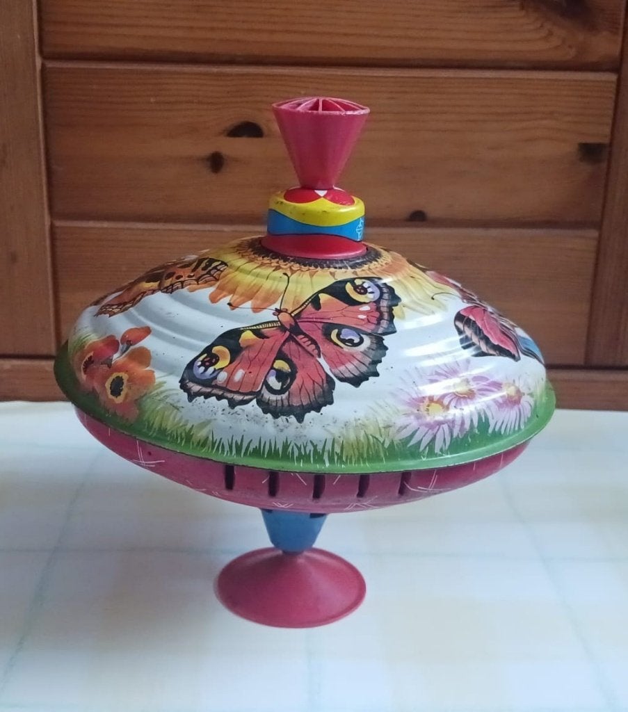vintage Blikken bromtol met bloem en vlinder, Antiek en Kunst, Ophalen of Verzenden