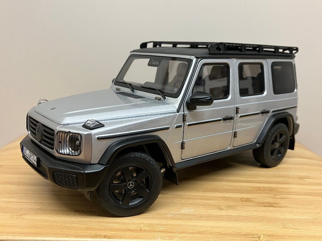 Mercedes G 500 van 2024 Iridium zilver metallic  1/18 Norev, Hobby en Vrije tijd, Modelauto's | 1:18, Ophalen of Verzenden, Nieuw