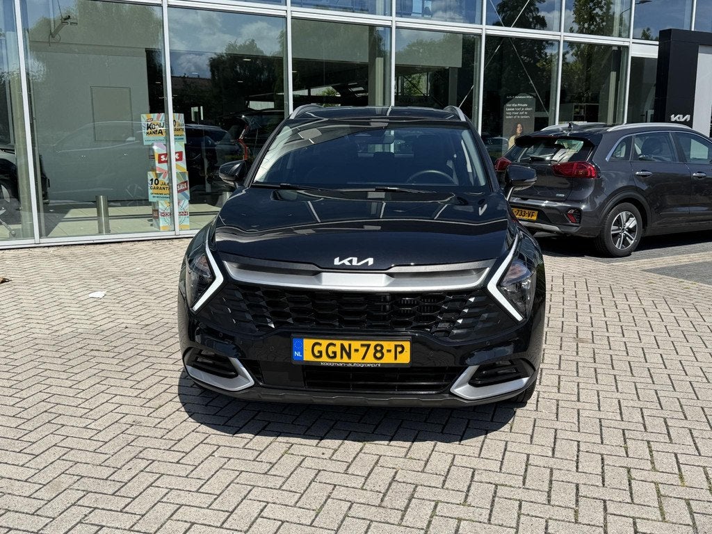 Kia Sportage 1.6 T-GDi Hybrid DynamicLine Nav|Camera|Lmv, Auto's, Stof, Gebruikt, Euro 6, 4 cilinders