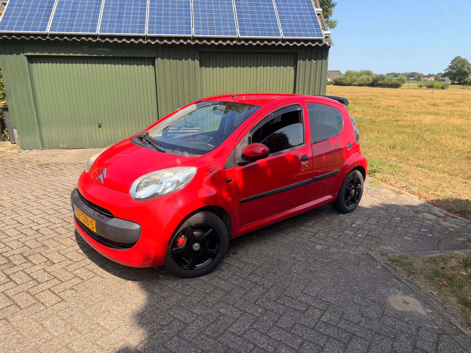 Citroën C1 1.0 5-DRS 2008 Rood, Auto's, Voorwielaandrijving, Zwart, 4 stoelen, C1