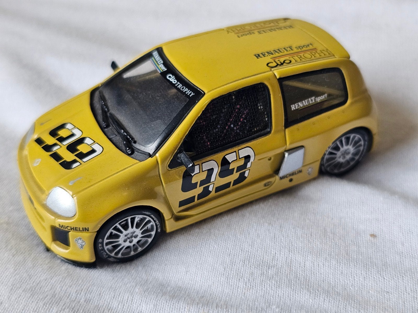 Renault Clio Trophy modelauto - Geel, Ophalen of Verzenden, Zo goed als nieuw, Auto
