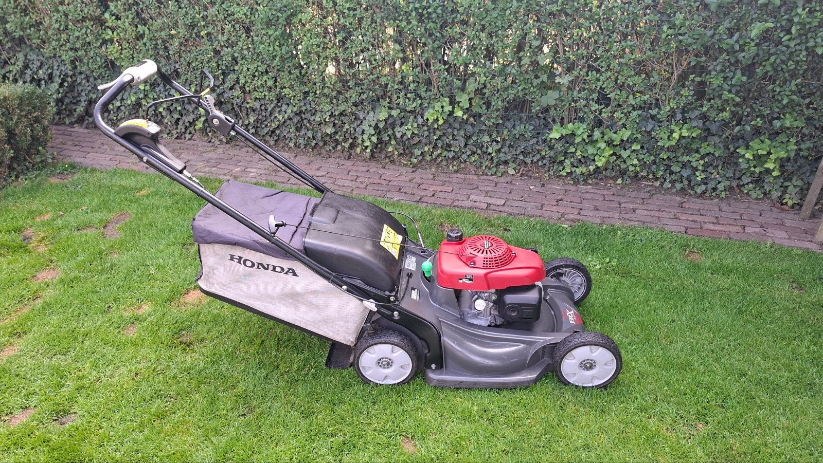 Honda hrx 537 variospeed, Tuin en Terras, Ophalen, Cirkelmaaier, Zo goed als nieuw, Benzine-grasmaaier