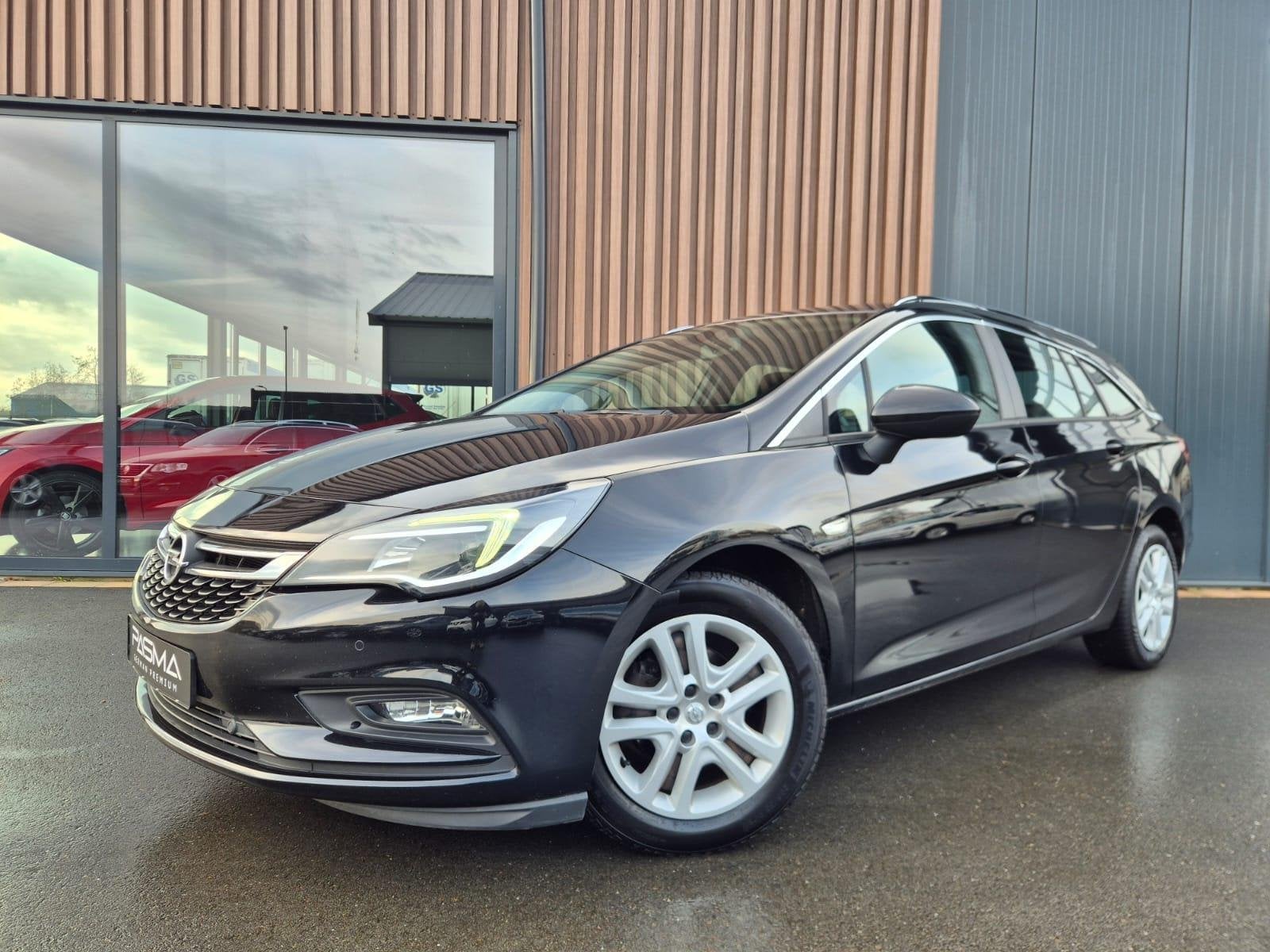 Opel Astra Sports Tourer 1.4 Turbo Edition | Automaat | Clim, Auto's, Stof, Gebruikt, 150 pk, Parkeersensor