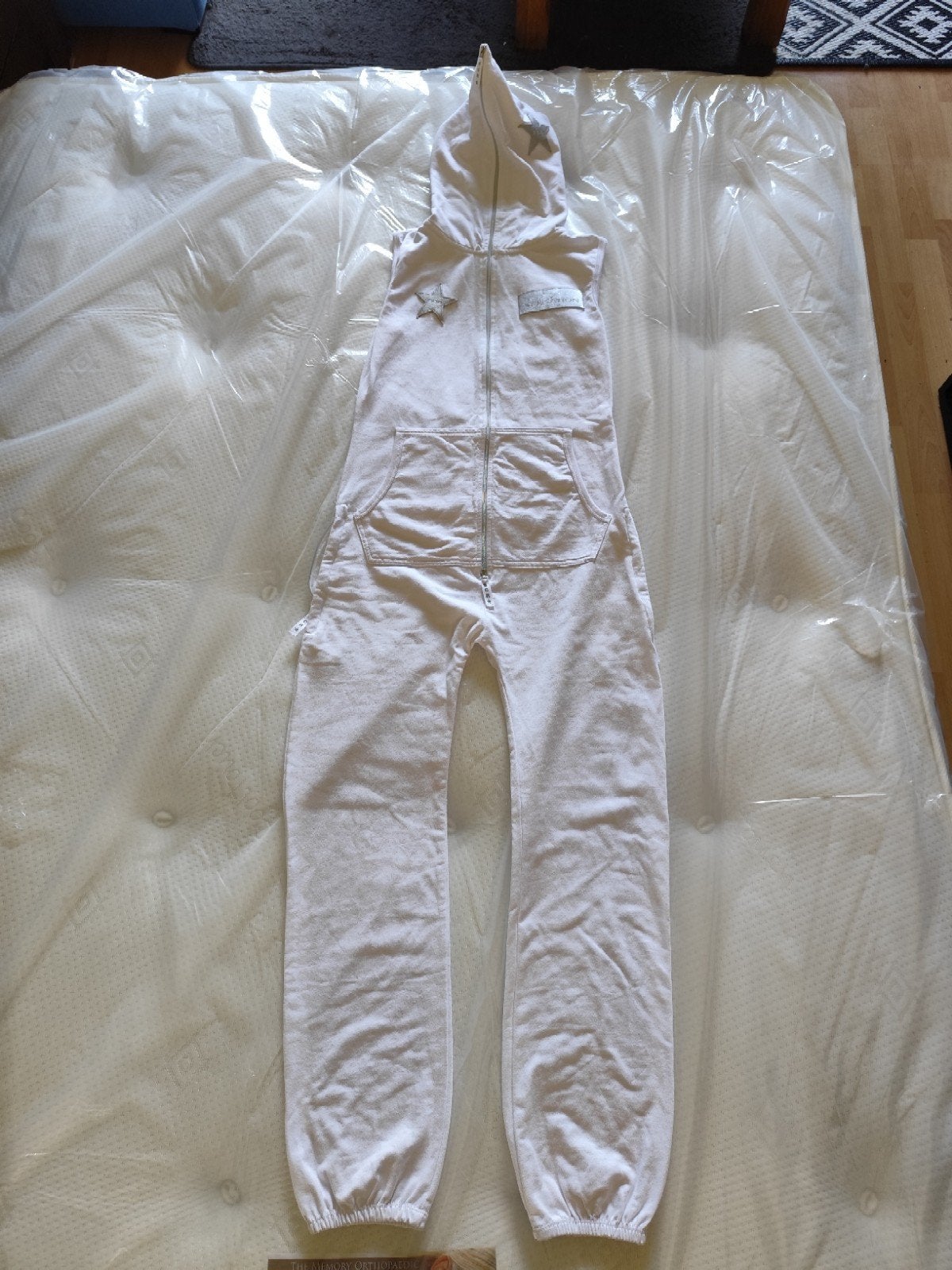 Sensation White jumpsuit met capuchon en rits - Nieuw, California Christiania, Nieuw, Ophalen of Verzenden, Overige thema's