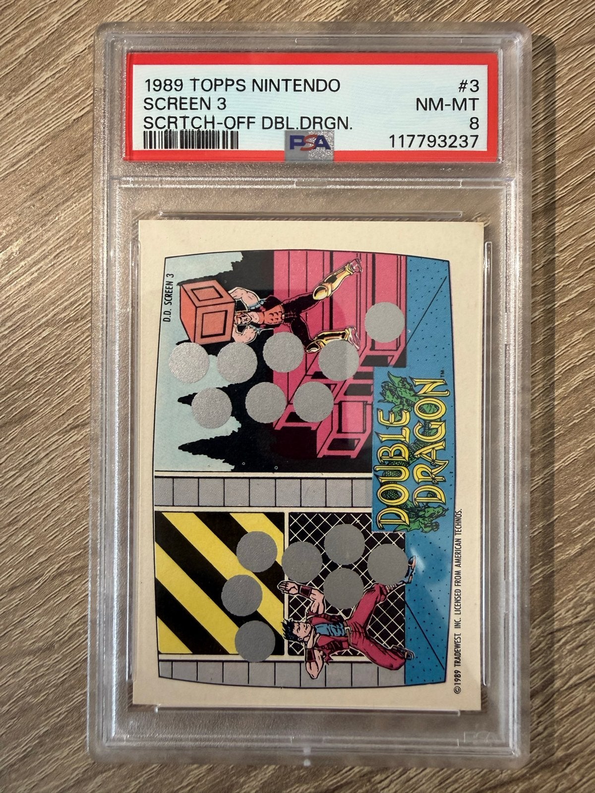 1989 Topps Nintendo Double Dragon Scratch-Off PSA 8 NM-MT, Ophalen of Verzenden, Zo goed als nieuw, Losse kaart