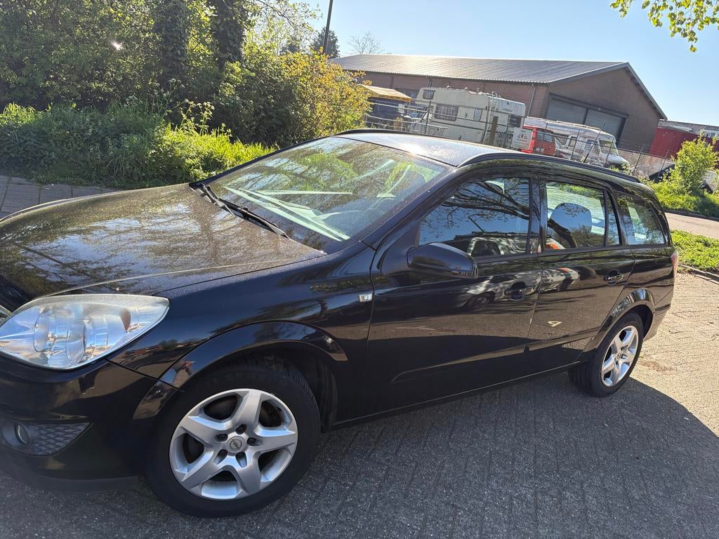 Opel Astra 1.6 16V 85KW St.wgn. 2008 Zwart, Auto's, Voorwielaandrijving, 657 kg, 15 km/l, 4 cilinders