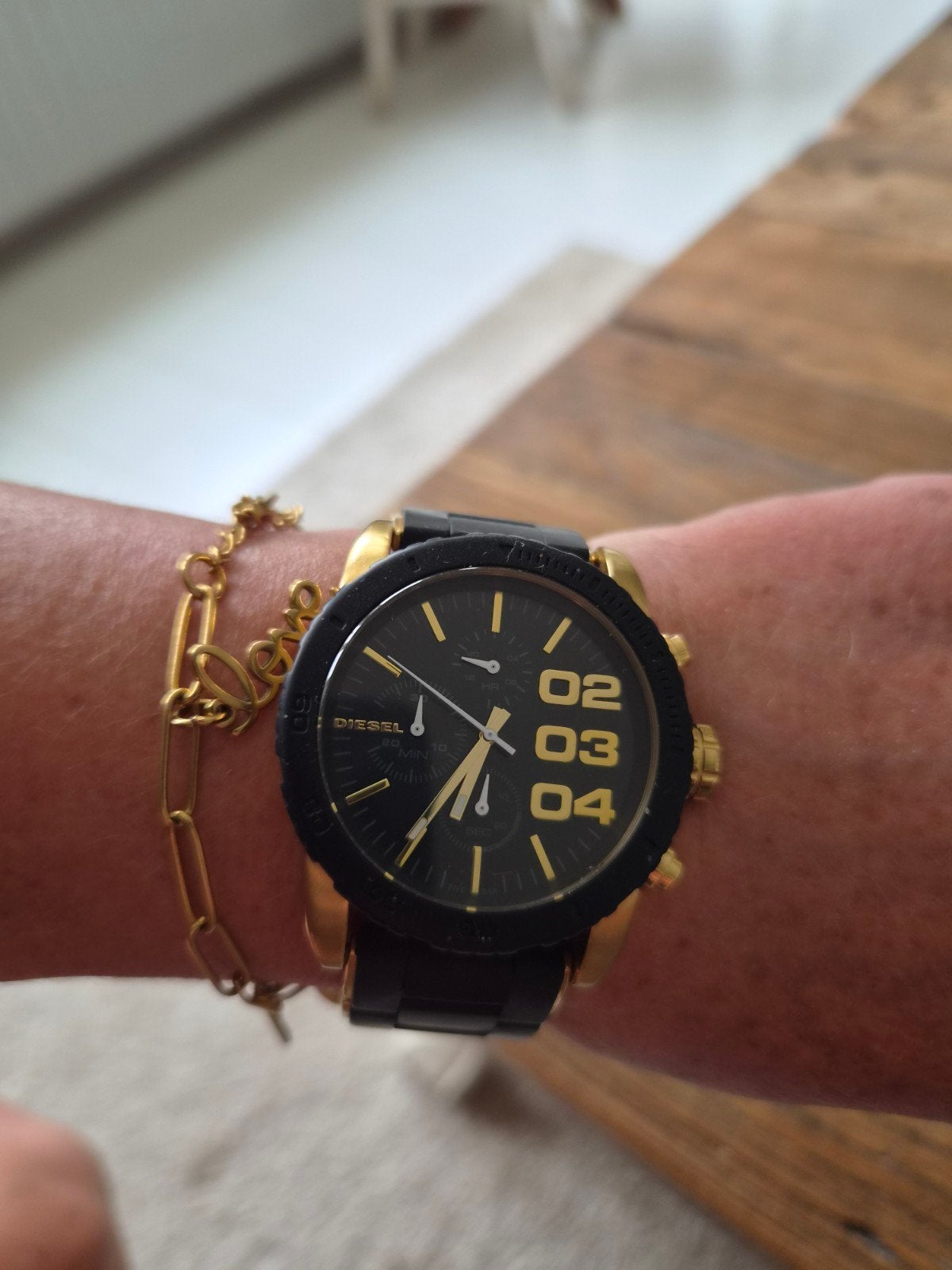 Diesel horloge goudkleurig met zwart bandje, Ophalen of Verzenden