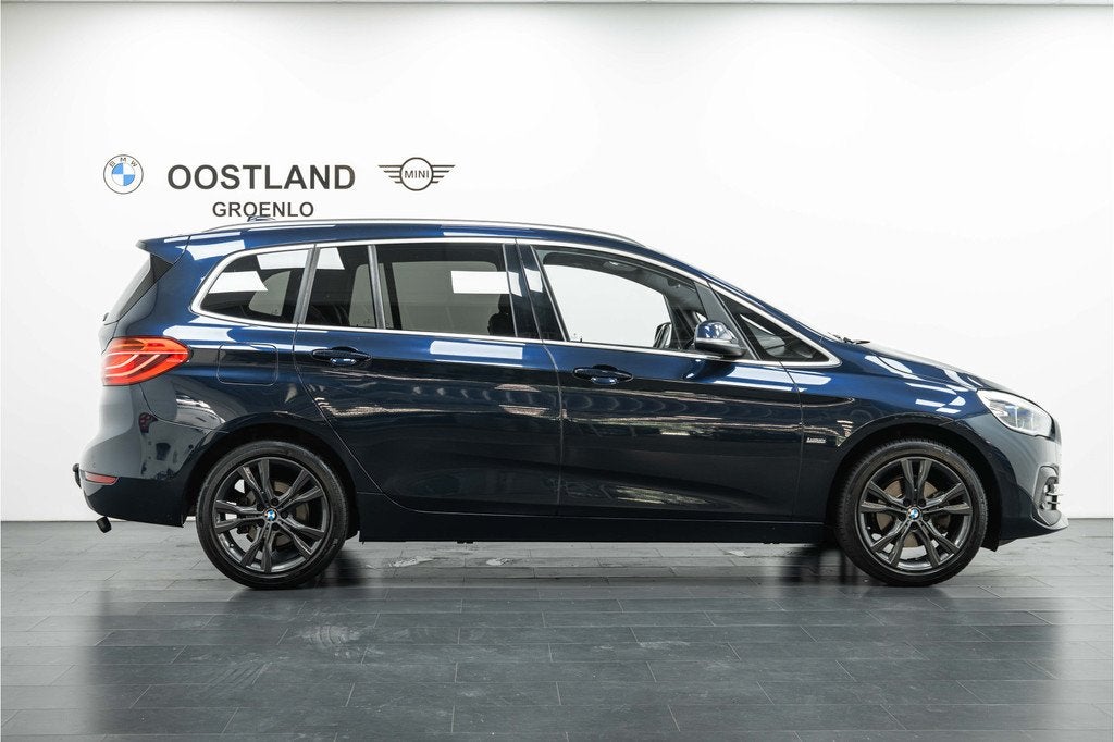 BMW 2 Serie Gran Tourer 218i 7p. Executive Automaat / Sports, Auto's, BMW, Gebruikt, Blauw, 3 cilinders, Automatische klimaatregeling