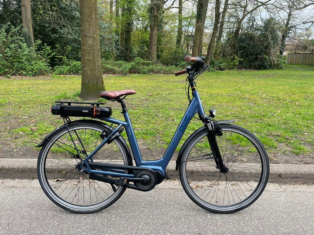 Qwic MN7 Premium middenmotor elektrische dames/herenfiets, Ophalen, Zo goed als nieuw, 50 km per accu of meer, Qwic