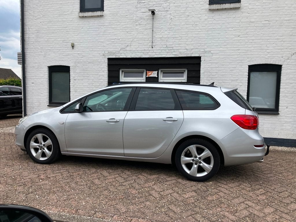 Opel Astra Sports Tourer 1.4 Turbo 1E EIG 120PK TREKHAAK CRU, Auto's, Opel, Voorwielaandrijving, Stof, Gebruikt, Zwart