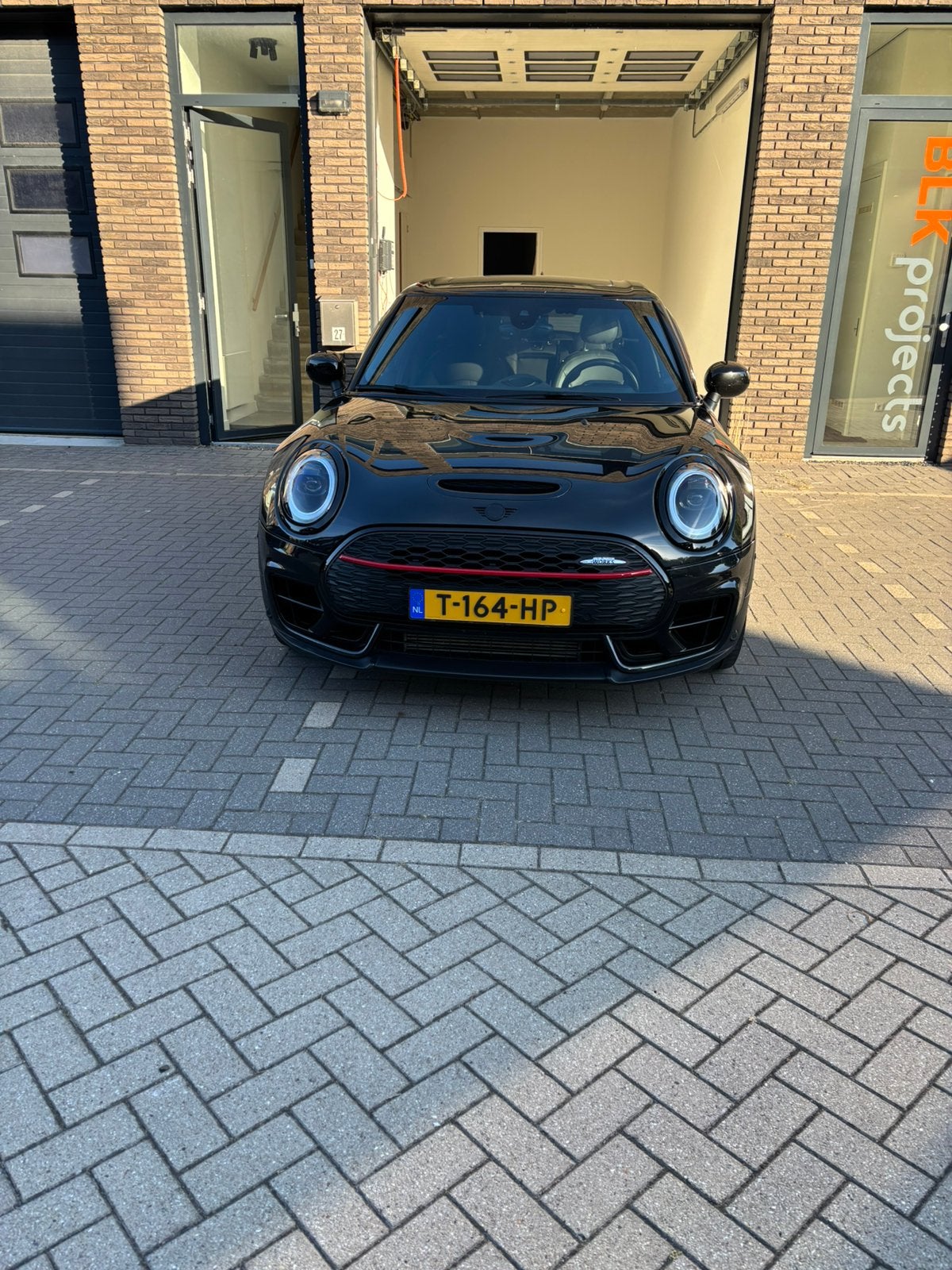 Mini Clubman 2.0 JCW 306pk All4 Aut met 2 jaar MINI garantie, Auto's, 1998 cc, 4 cilinders, Zwart, Stationwagon