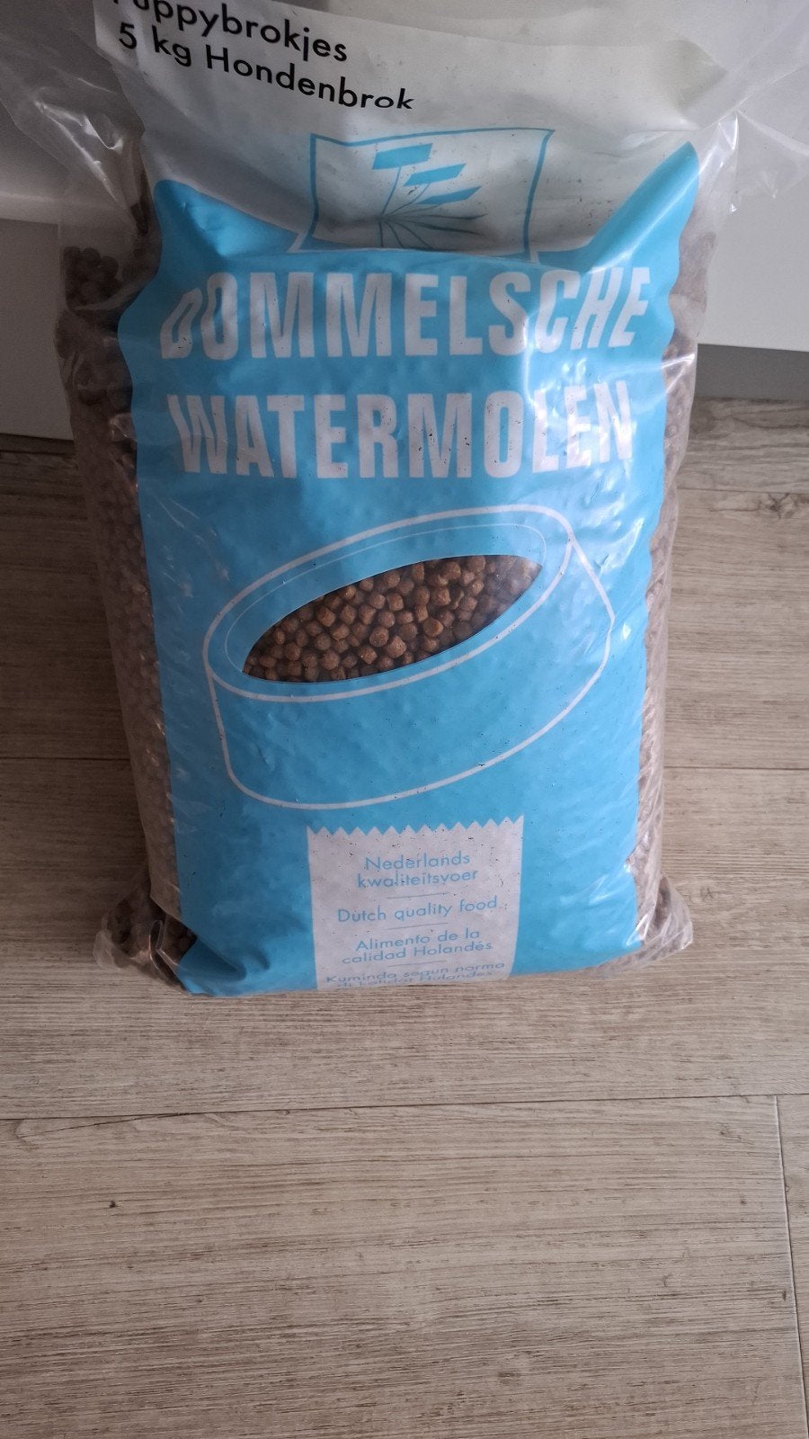 puppy brokken, Ophalen, Hond