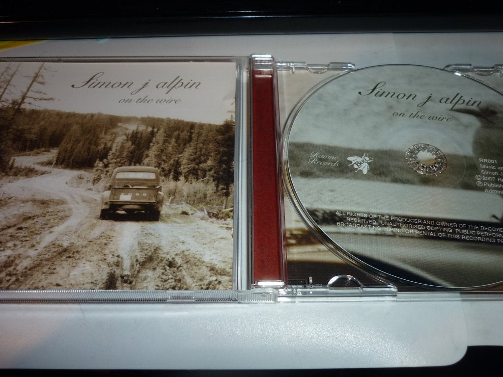 Simon J Alpin - On The Wire CD (2007), Singer-songwriter, Inclusief doosje, Ophalen of Verzenden, Zo goed als nieuw