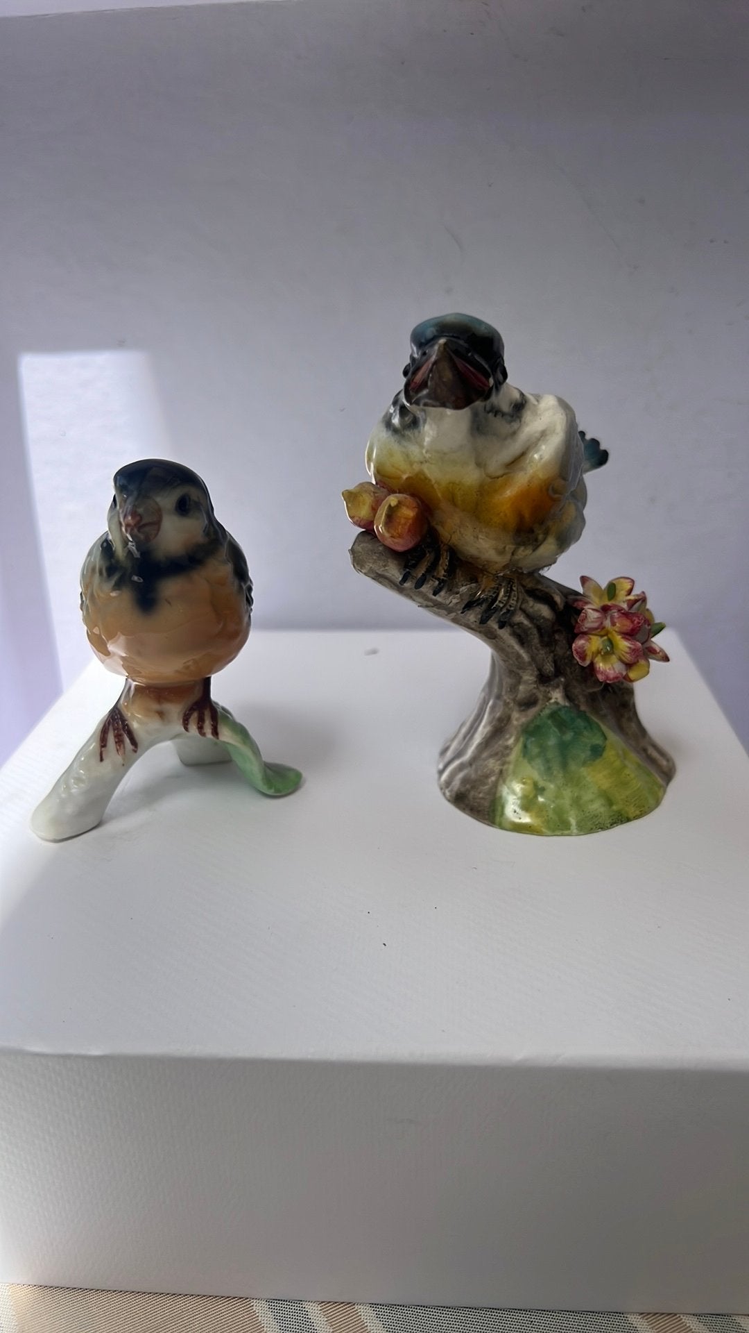 Set van 2 vintage keramieken vogelbeeldjes
