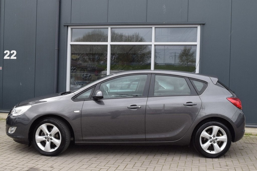 Opel Astra 1.4 Turbo Color Edition | Airco | Cruise | NAP +, Auto's, Opel, Voorwielaandrijving, Euro 5, Stof, Gebruikt
