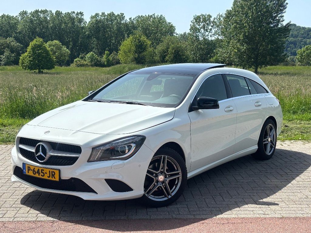 Mercedes-Benz CLA 1.6 Cla200 115KW Sh.br. 7G-DCT 2015 Wit, Auto's, CLA, Zwart, Leder en Stof, Wit