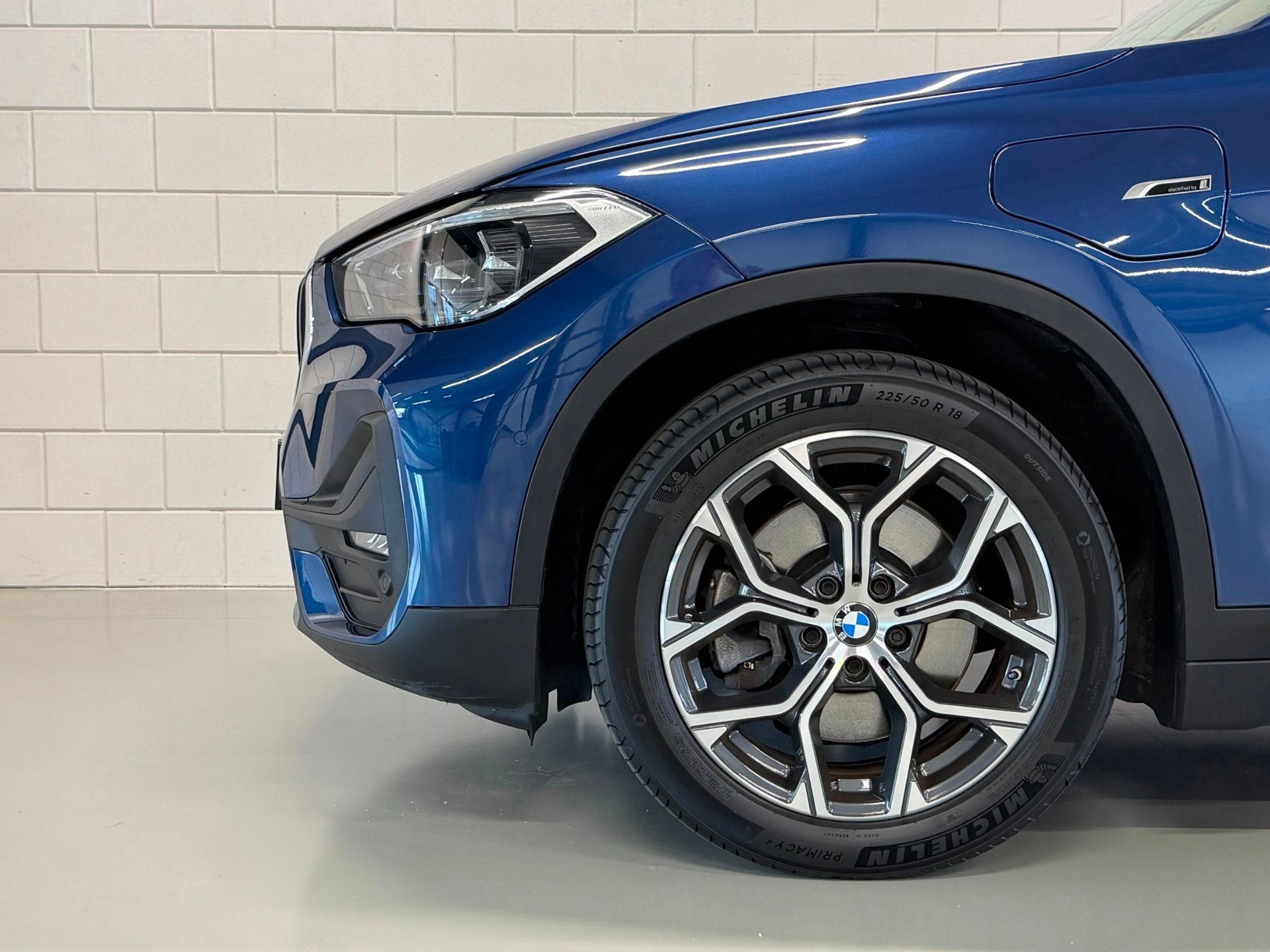 BMW X1 XDrive25e High Executive | PANO | 1E EIG | DEALER | L, Auto's, 8 kWh, Gebruikt, Blauw, Vierwielaandrijving