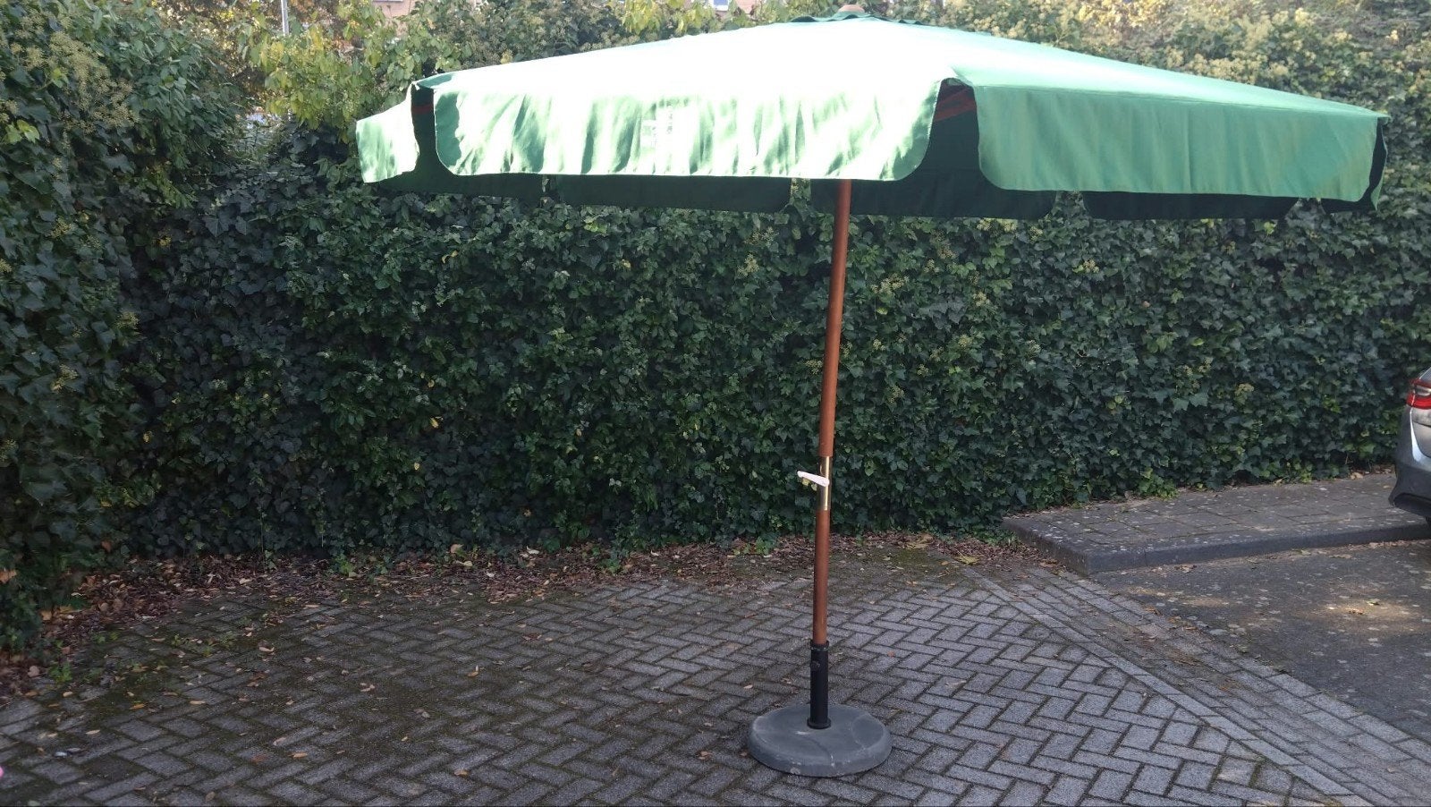 Groene parasol zonder voet, Ophalen, Gebruikt