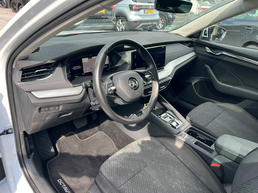 Skoda Octavia Combi 1.4 TSI iV PHEV Sportline Business pano,, Auto's, Skoda, Stof, Gebruikt, Wit, Hybride Elektrisch/Benzine