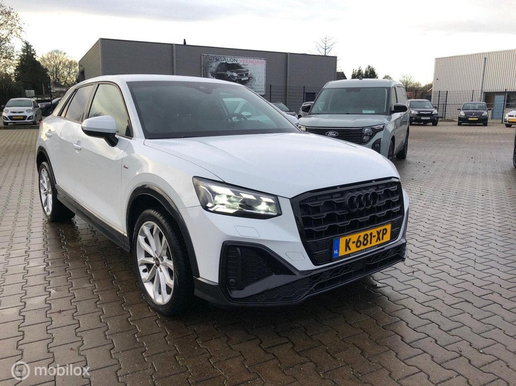 Audi Q2 35 TFSI 3x S LINE ALLE OPTIE,S, Auto's, Audi, 4 cilinders, 150 pk, Leder en Stof, Wit