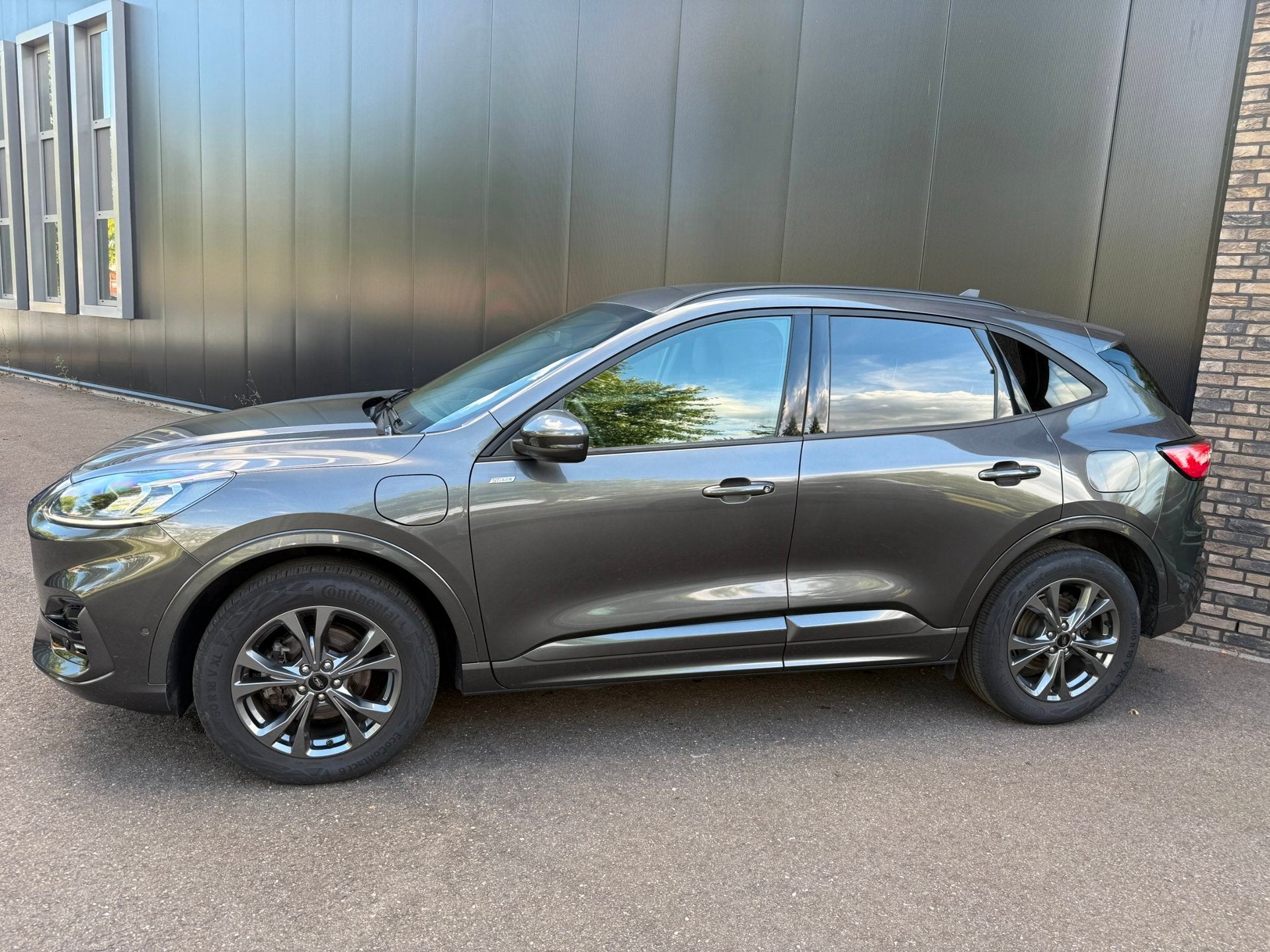 Ford Kuga 2.5 225pk PHEV ST-Line X Navi, B&O, AGR, Camera's,, Dealer onderhouden, Gebruikt, Zwart, 4 cilinders