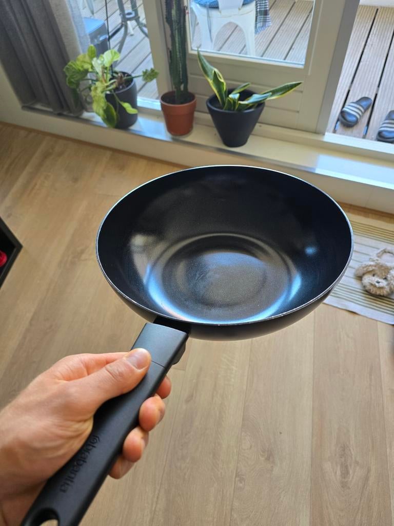 Wok pans, Ophalen, Wok