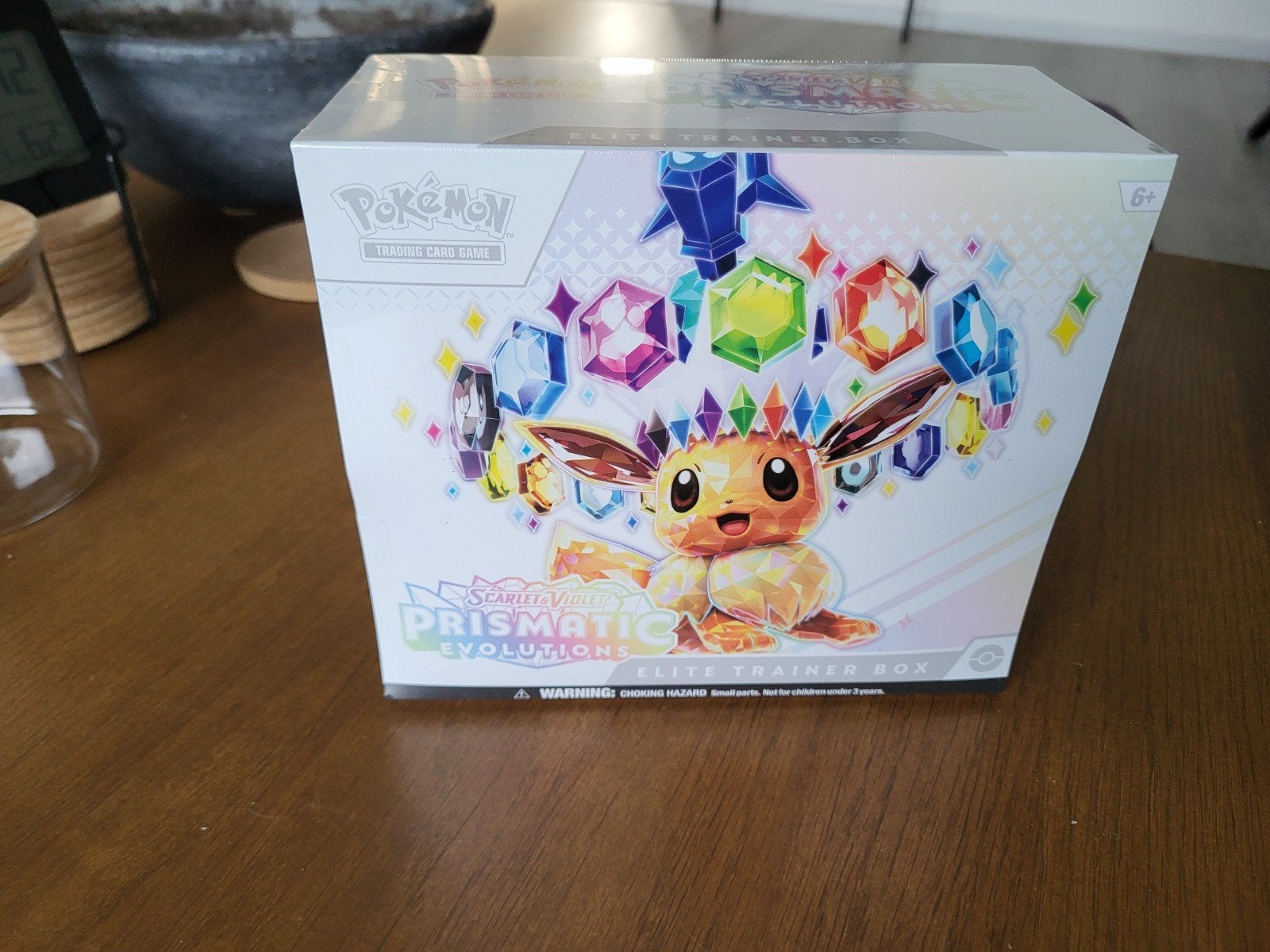 Pokémon Prismatic Evolutions ETB sealed, Ophalen of Verzenden, Nieuw, Boosterbox, Foil
