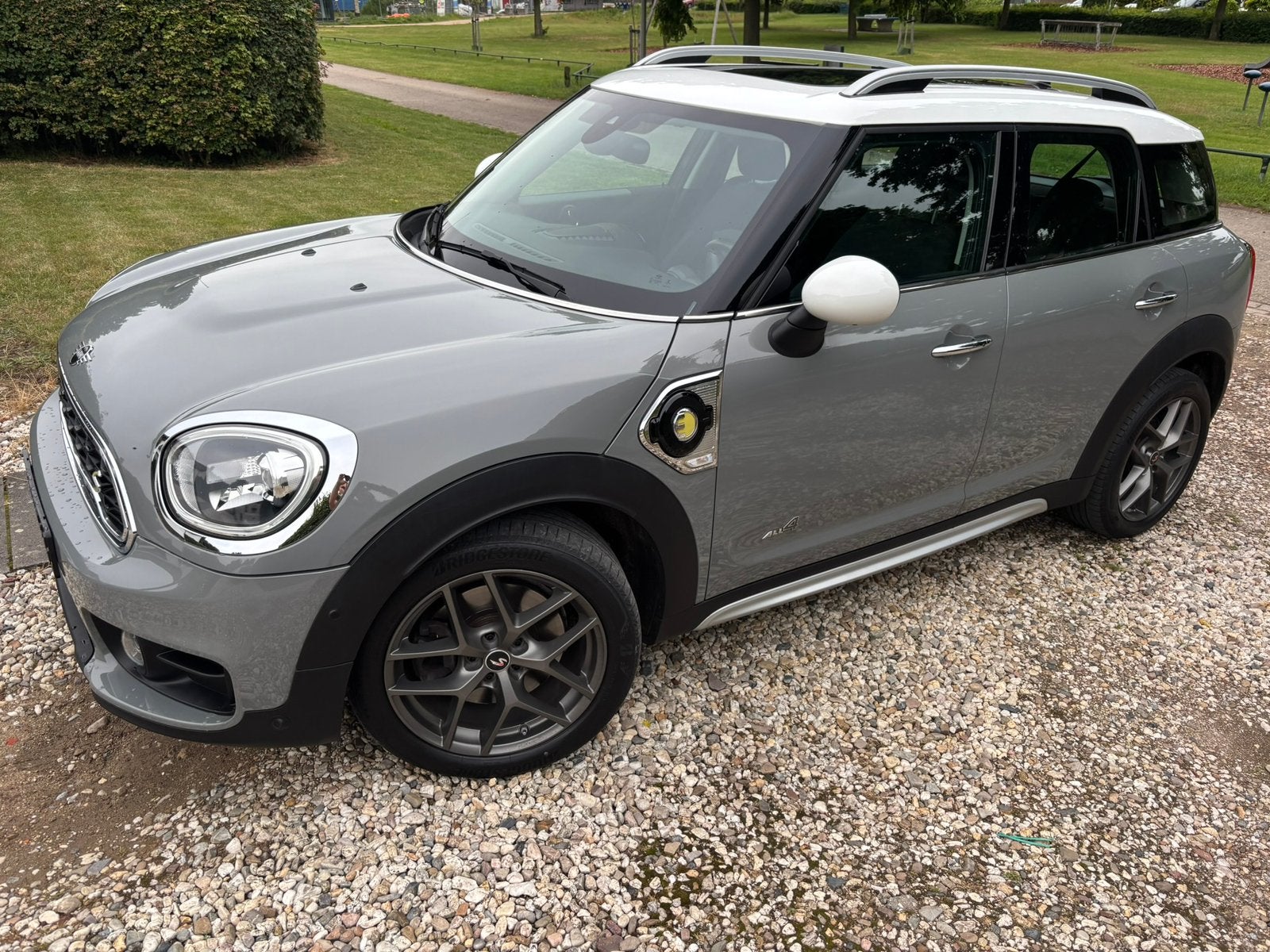 Mini Countryman 1.5 E 224pk All4 Aut. 2019 Grijs, Auto's, Mini, Zwart, Countryman, Leder en Stof, Plug-in hybride
