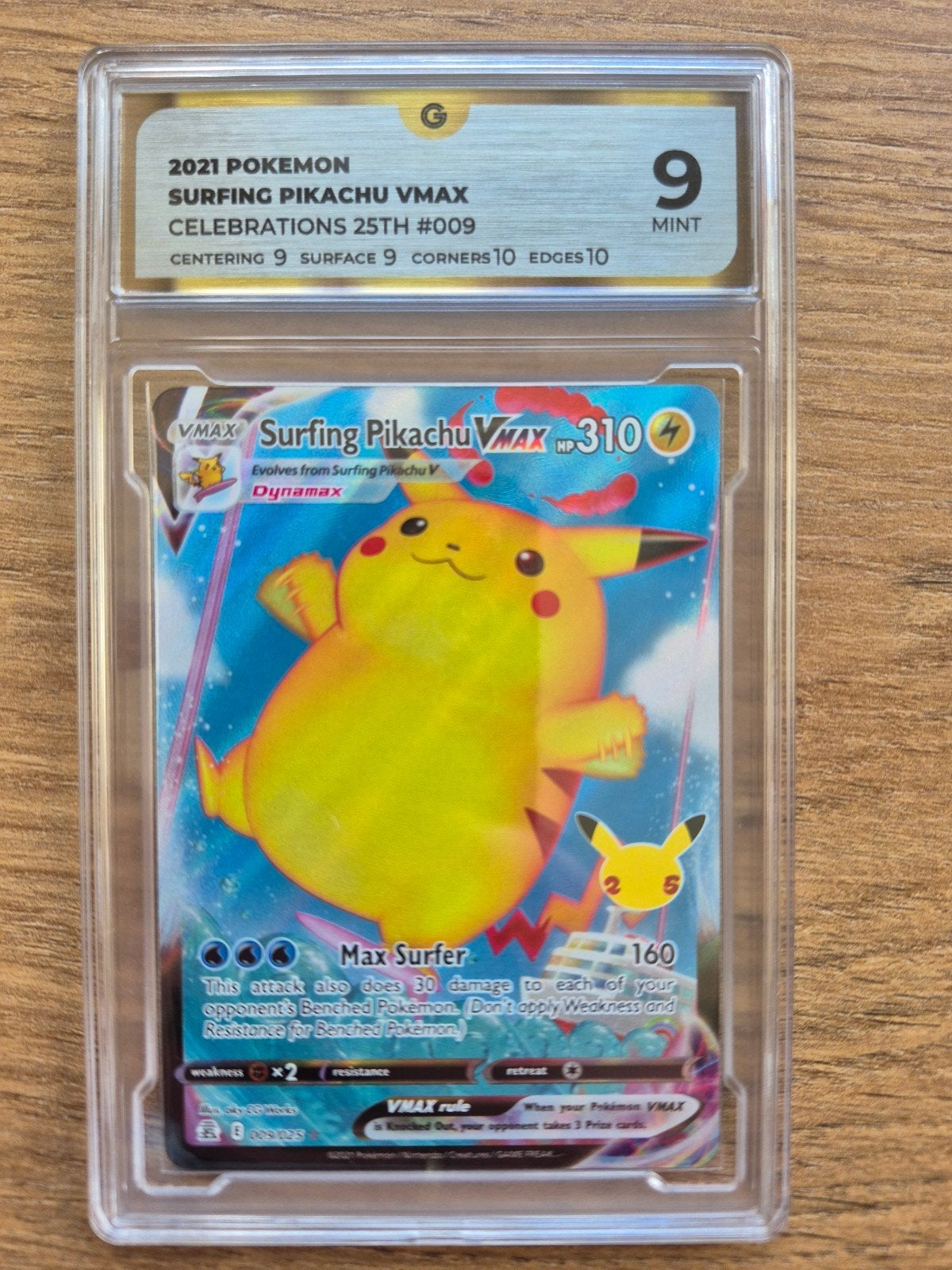 Pokemon Surfing Pikachu VMAX Celebrations #009 GG9, Ophalen of Verzenden, Zo goed als nieuw, Losse kaart