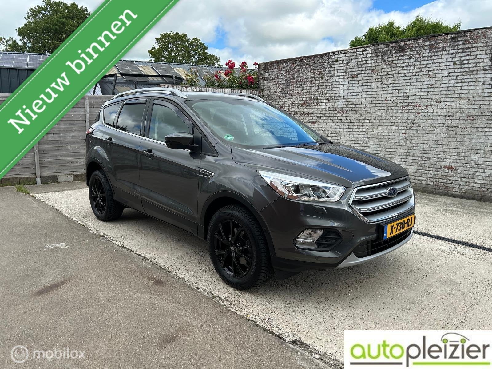 Ford Kuga 1.5 EcoBoost Titanium|Allseason|revisie motor, Voorwielaandrijving, Euro 6, 4 cilinders, 14 km/l