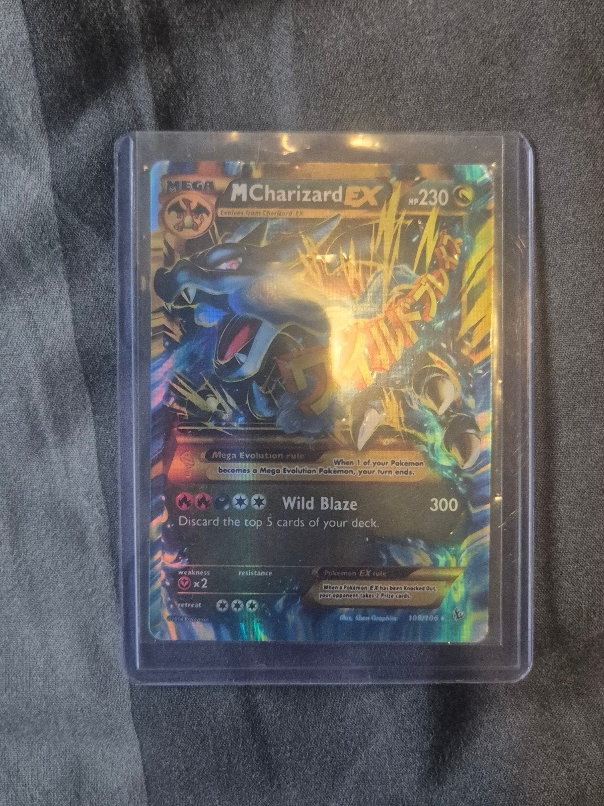 M Charizard EX #108/106, Ophalen of Verzenden, Zo goed als nieuw, Losse kaart, Foil