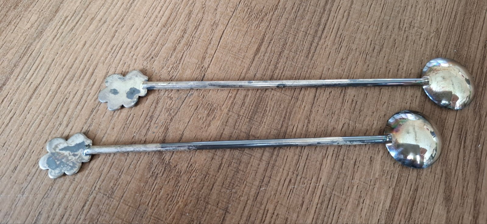 2 Verzilverde Felix Theelepels met Pootafdruk, Ophalen of Verzenden