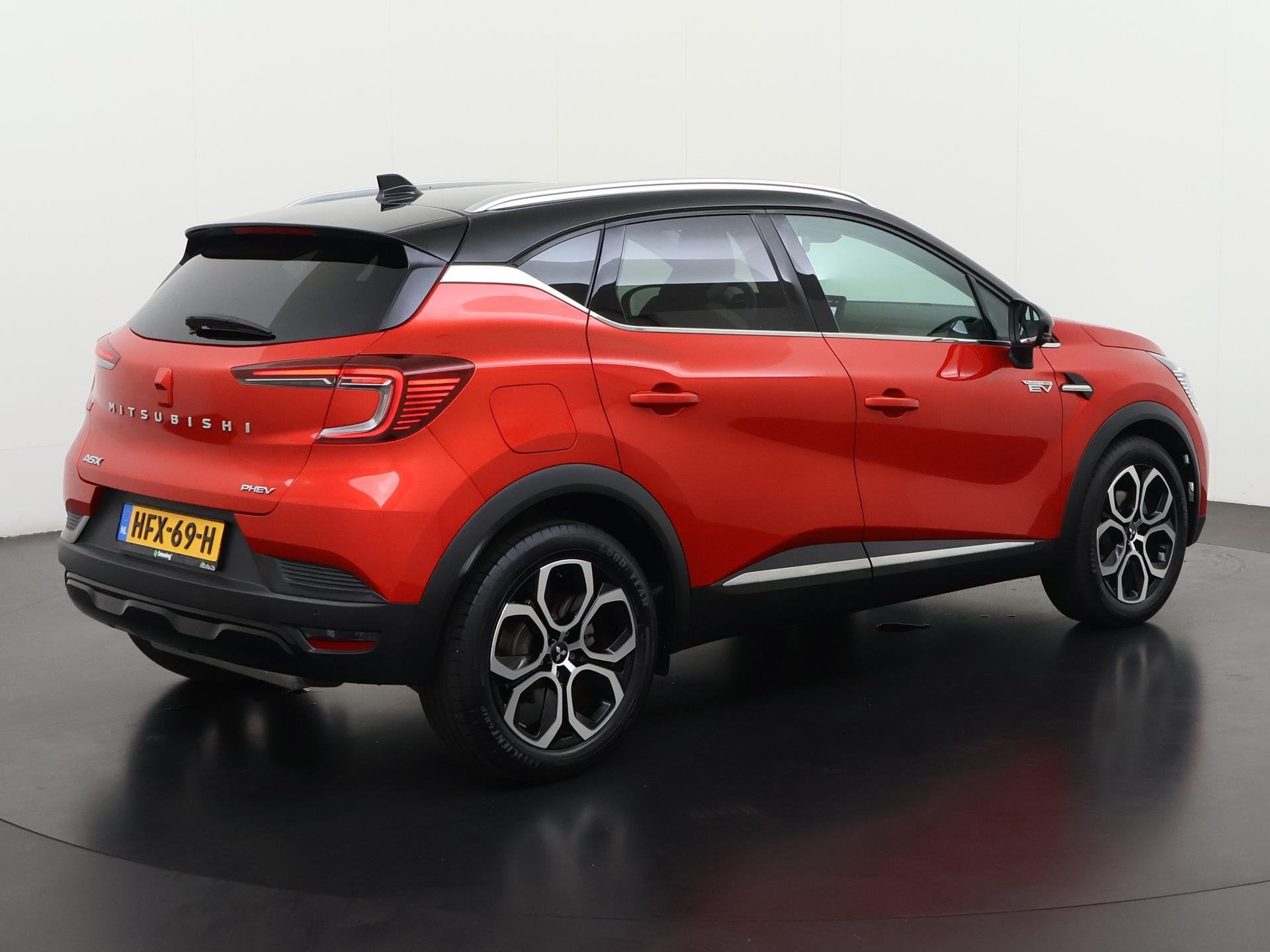 Renault Captur 1.6 PHEV Plug-in AT Intense Bi-Tone | Camera, Auto's, 12 maanden, Stof, Gebruikt, Euro 6