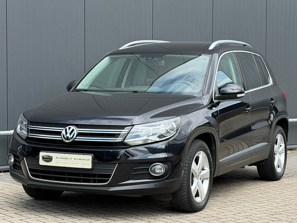 Volkswagen Tiguan 1.4 TSi 122pk 6-bak Sport & Style, Auto's, Voorwielaandrijving, Zwart, 4 cilinders, Handgeschakeld