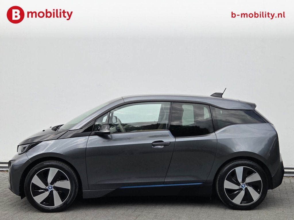 BMW i3 High Voltage Edition 94Ah 33 kWh SOH 87% Warmtepomp S, Auto's, BMW, Automaat, Achterwielaandrijving, Gebruikt, Zwart