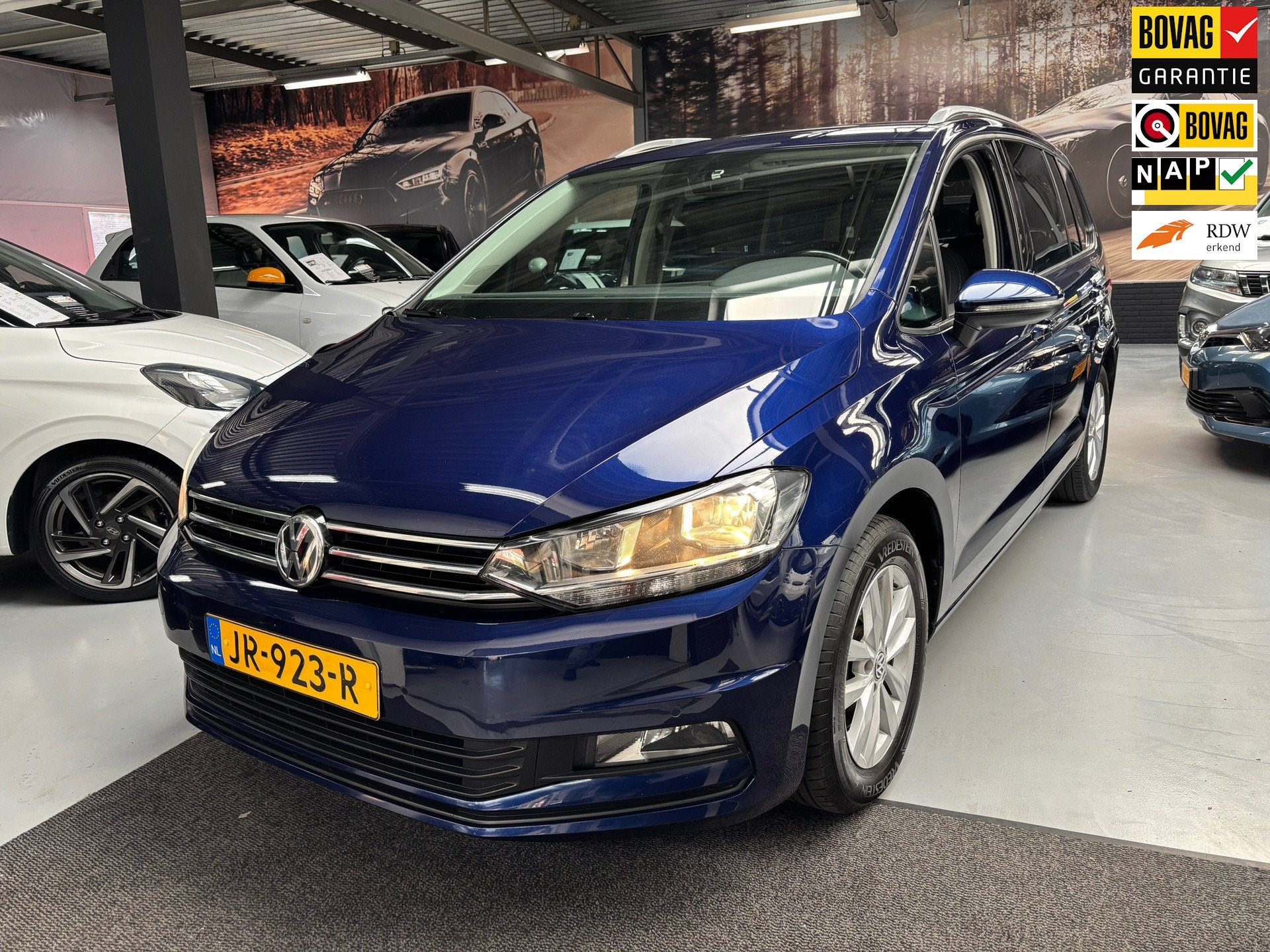 Volkswagen Touran 1.2 TSI Comfortline 7persoons / Navi, Voorwielaandrijving, Gebruikt, 4 cilinders, Met garantie (alle)