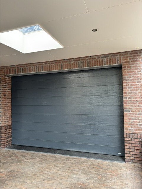 Sectionaaldeur RAL 7016 antraciet – houtnerf – bouwjaar 2014, Ophalen, Kunststof, Gebruikt, Garagedeur