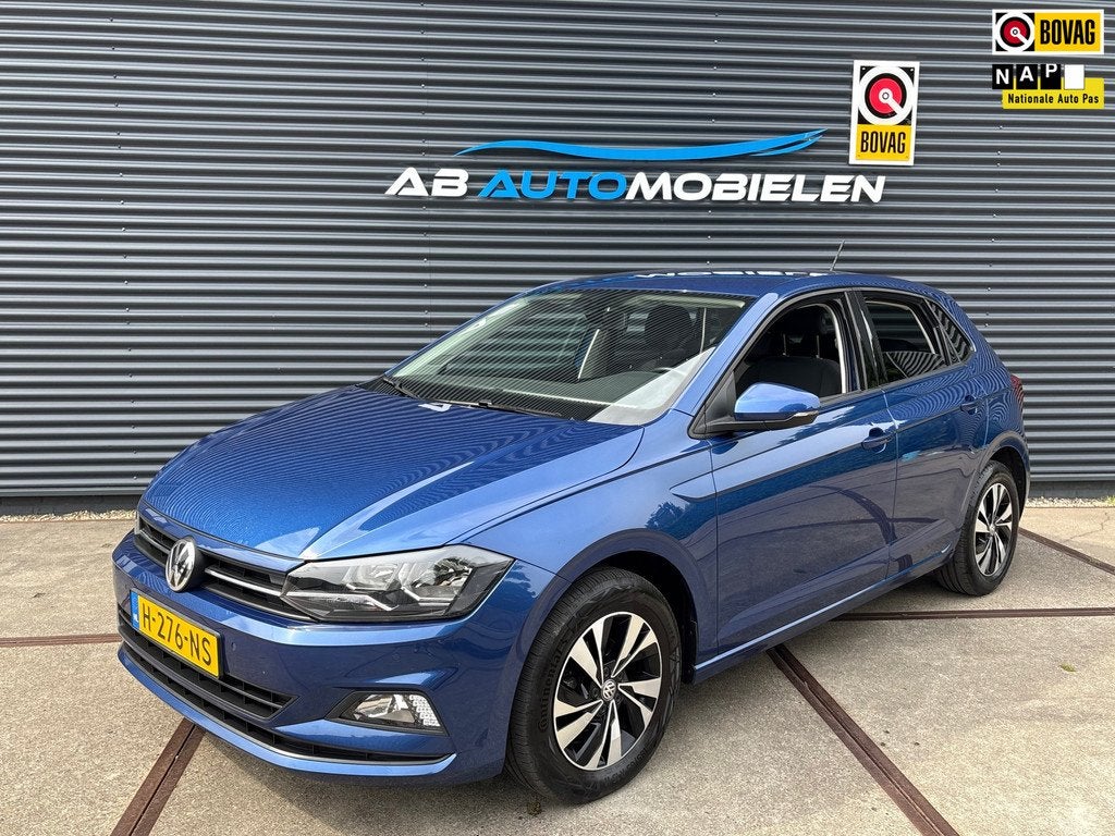 Volkswagen Polo 1.0 TSI Comfortline AUTOMAAT/ CARPLAY/ PARKE, Gebruikt, 95 pk, Met garantie (alle), Blauw
