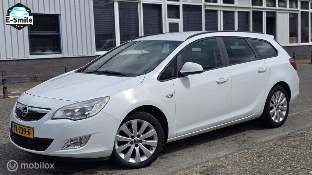 Opel Astra Sports Tourer 1.6 Edition/Automaat/Airco/Cruise, Auto's, Opel, Euro 5, Gebruikt, 4 cilinders, 116 pk