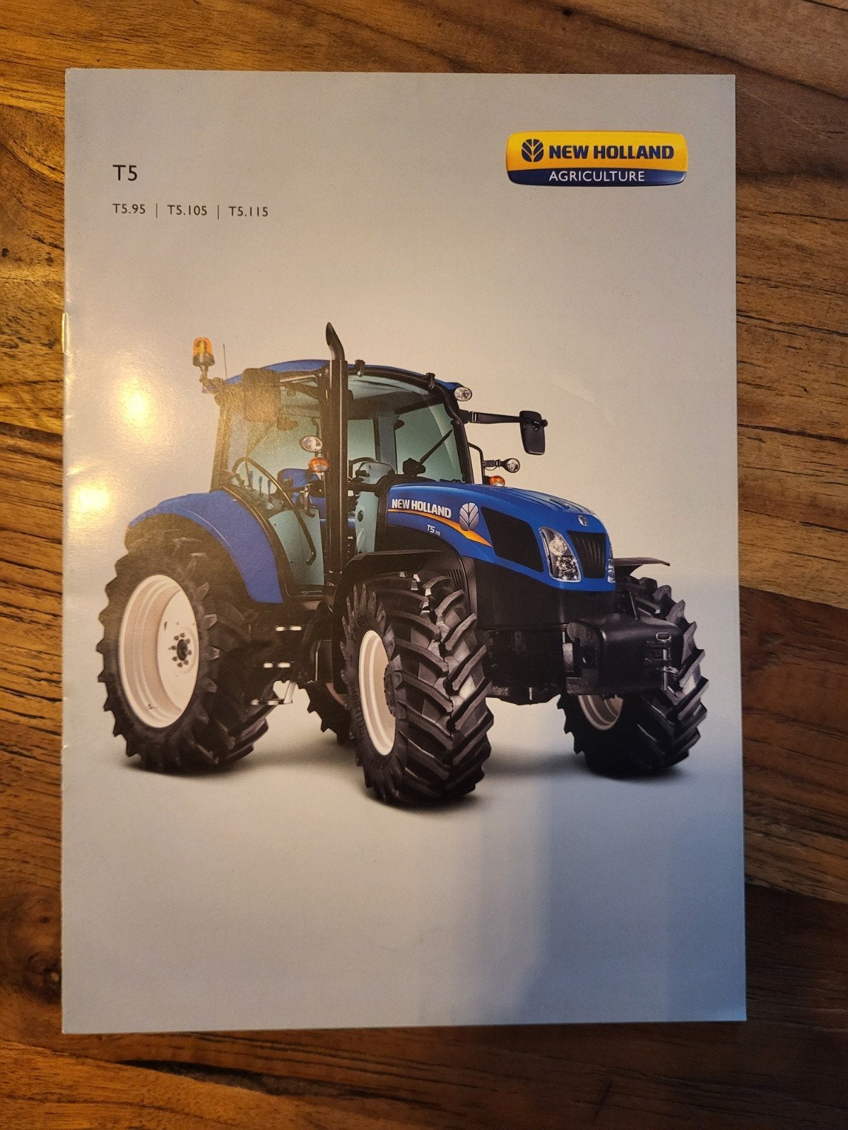 tractor folder New Holland T5, Ophalen of Verzenden