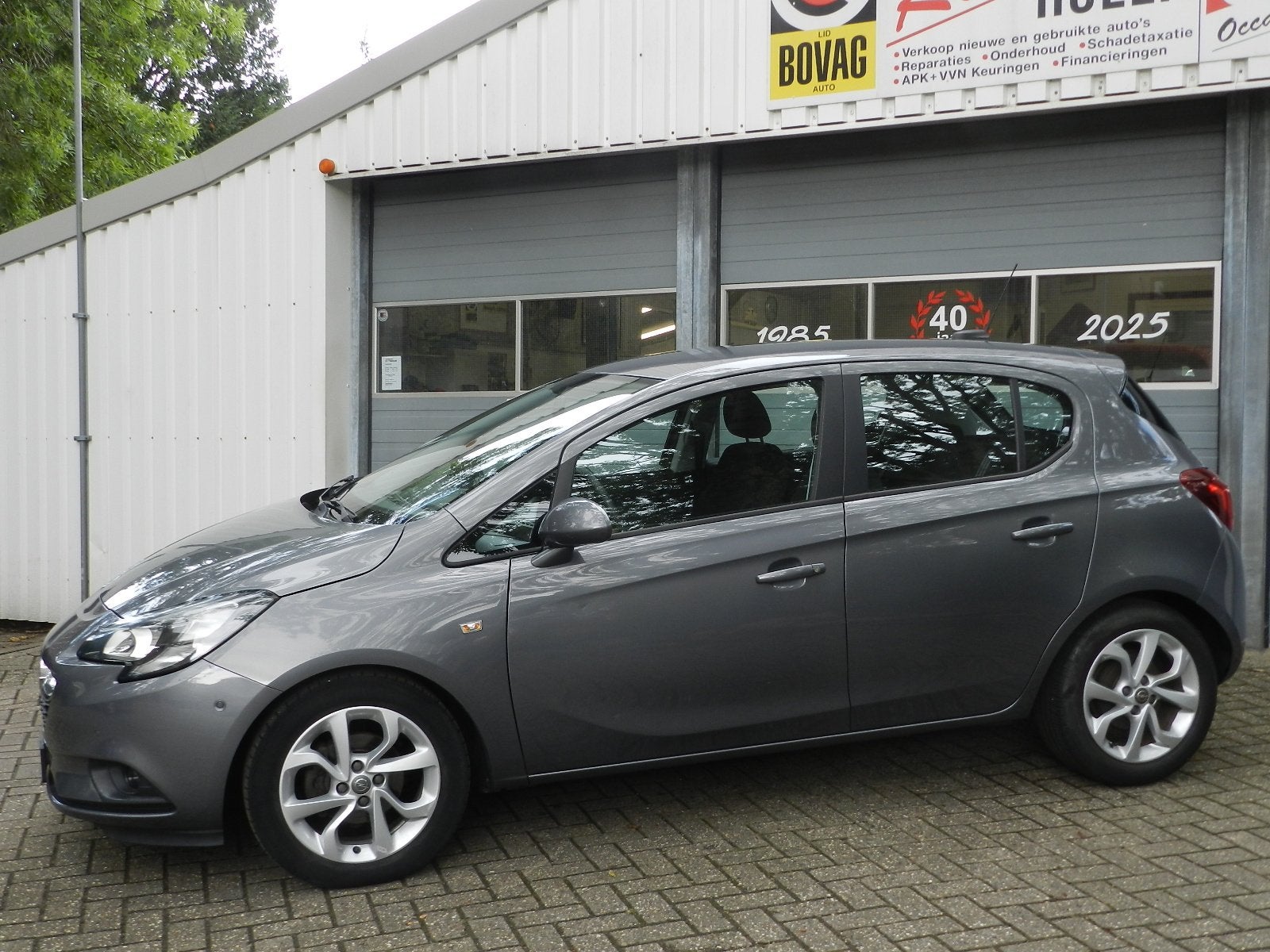 Opel Corsa 1.4 Automaat 5Drs Edition Cruise contr PDC Camera, Auto's, Dealer onderhouden, Gebruikt, 4 cilinders, Startonderbreker