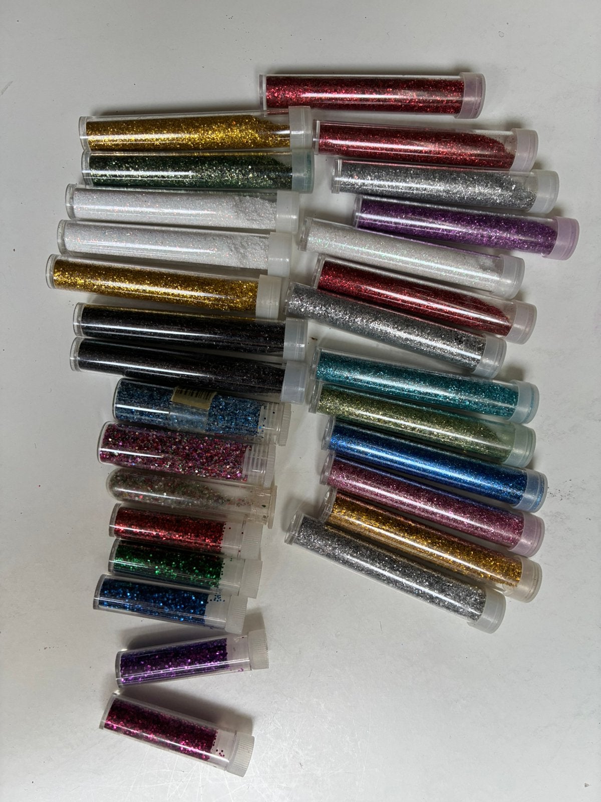 Glitters, Ophalen of Verzenden, Zo goed als nieuw