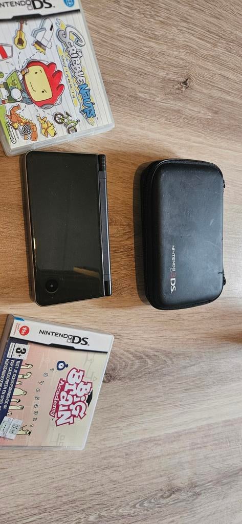 Nintendo DSi XL met 2 games en 3DS hoes, Spelcomputers en Games, Spelcomputers | Nintendo DS, Dsi XL, Gebruikt, Zwart, Ophalen of Verzenden