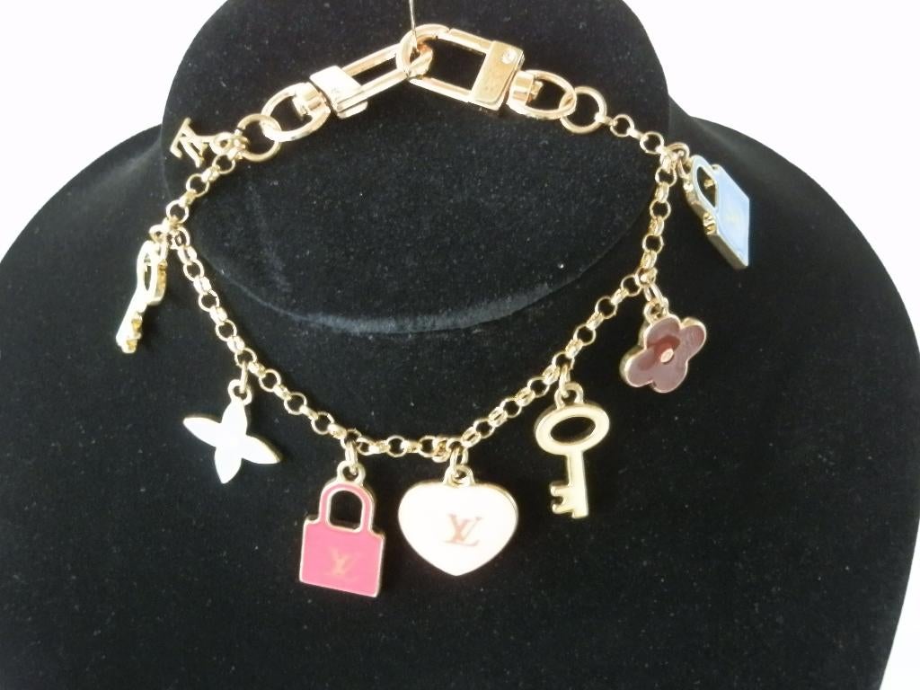 Louis Vuitton ketting voor damestas., Sieraden, Tassen en Uiterlijk, Kettingen, Ophalen of Verzenden, Zo goed als nieuw, Overige kleuren
