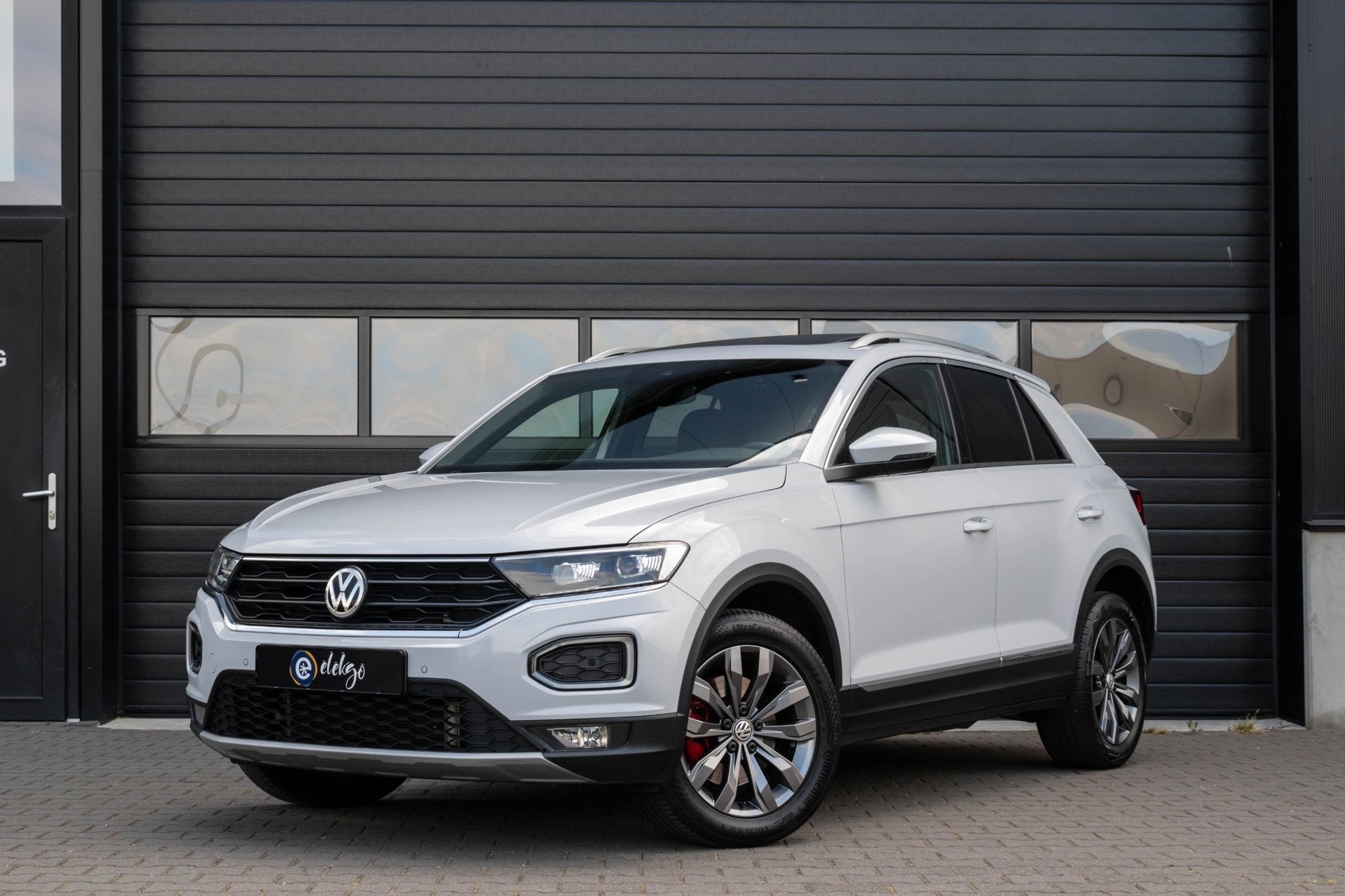 Volkswagen T-Roc 2.0 TSI 4Motion Sport|Pano|Winterpakket|Key, Auto's, Volkswagen, Automaat, Stof, Gebruikt, Zwart