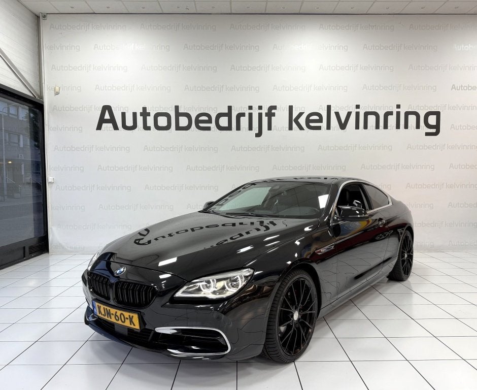BMW 6 Serie 640i High Executive Bovag Garantie (bj 2015), Achterwielaandrijving, Euro 6, Zwart, Leder
