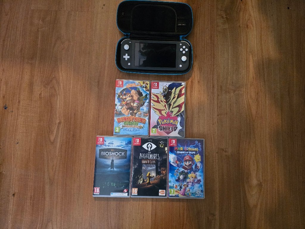 Nintendo Switch Lite met 5 spellen en beschermhoes, Spelcomputers en Games, Spelcomputers | Nintendo Switch Lite, Ophalen of Verzenden