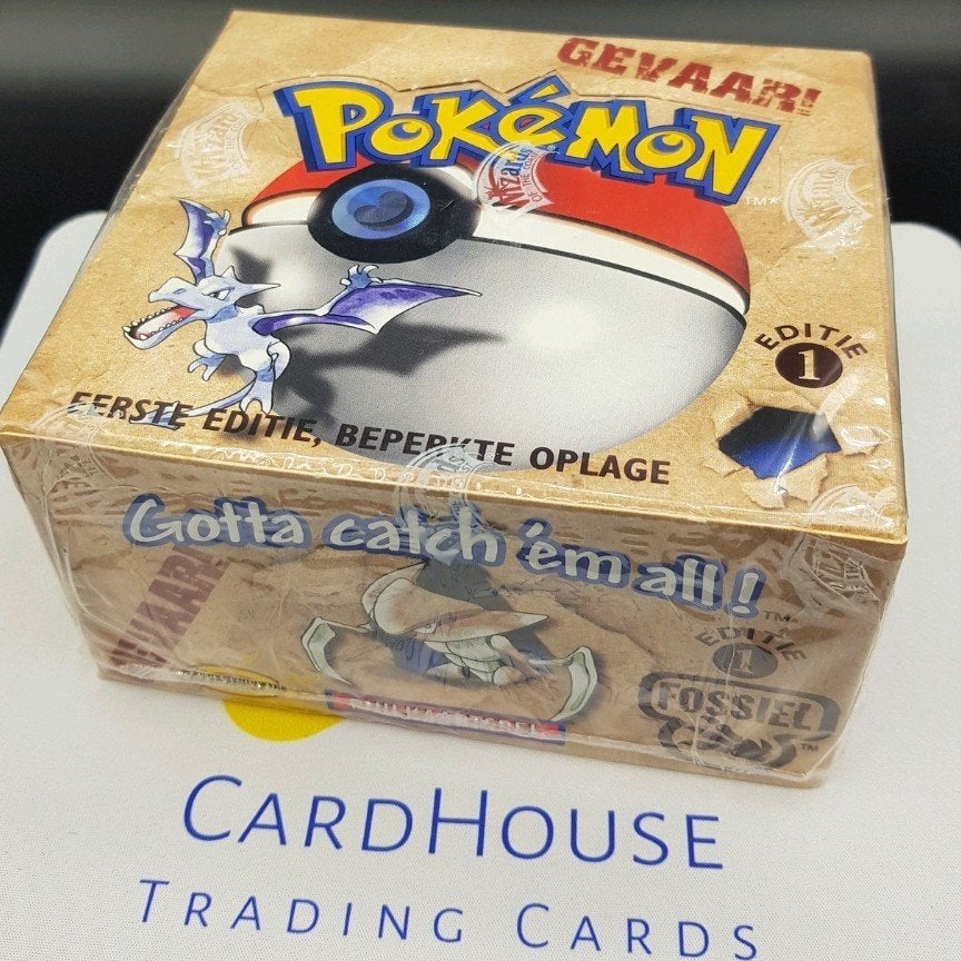 Fossil 1st Edition Booster Box NL 1999 Factory Sealed, Hobby en Vrije tijd, Verzamelkaartspellen | Pokémon, Ophalen of Verzenden